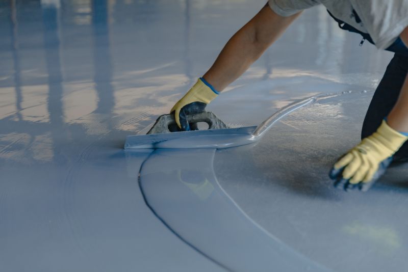levelling epoxy mixture on the floor